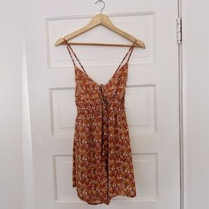 Floral Orange Romper by Love Tree